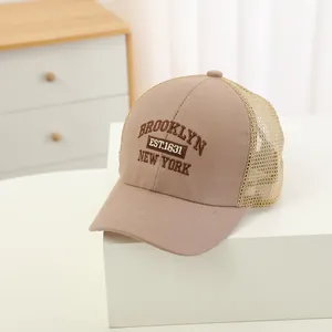 Detail of Brooklyn embroidery on breathable mesh baseball cap for kids and adults