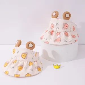 Close-up of baby sun visor with cute 3D bear ears and cartoon prints on soft fabric