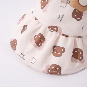 Detail of baby sun hat featuring bear prints and ruffles with fine stitching