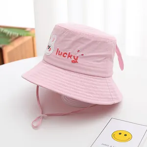 Detail of pink toddler sun hat with bunny embroidery and adjustable chin strap