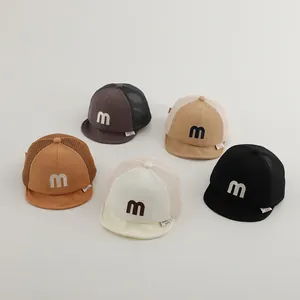 Detail view of breathable mesh baby baseball caps with M embroidery in five colors