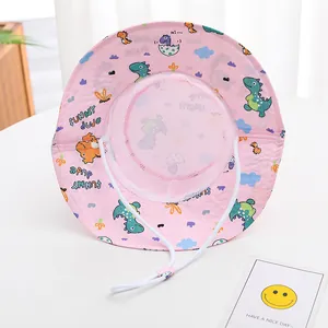 Pink kids sun hat with colorful dinosaur prints and breathable mesh inner lining