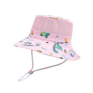 Pink kids sun hat with cartoon dinosaur patterns and breathable mesh top on white background