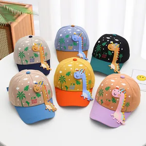 Flat lay of six colorful dinosaur baseball caps for kids with I'm Hungry cartoon design