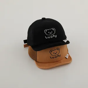 Kids breathable baseball caps with cute bear embroidery and Lucky letter detail