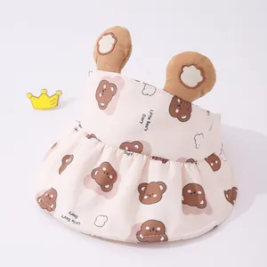 Detail of pink toddler sun hat featuring bear prints, 3D ears, and cotton fabric texture