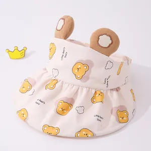 Detail of pink toddler sun visor with cute bear pattern and 3D ear decorations