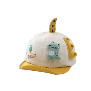 Casquette de baseball dinosaure pour bébés en beige et jaune avec bord souple solaire