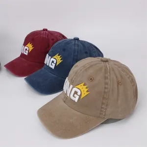 Vintage washed cotton baseball caps for kids with KING embroidery in burgundy, navy, and khaki