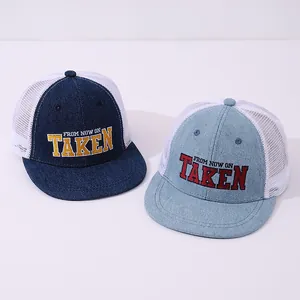Kids denim flat brim mesh trucker hats with TAKEN embroidery in dark and light blue denim