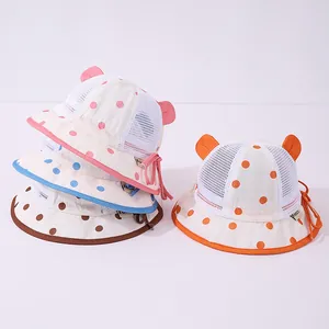 Close-up of breathable mesh summer baby sun hats with polka dots and cute 3D ears
