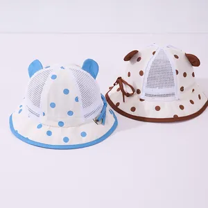Detail of baby sun hat with breathable mesh mesh, cute ears and polka dot patterns