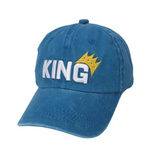Blue kids baseball cap with yellow crown and KING embroidery on a white background