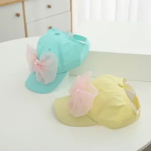 Kids open top sun hat with large pink bow and pearls in mint green and yellow colors