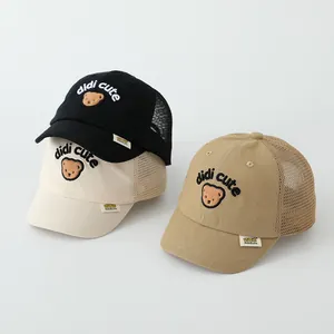 Detail of breathable mesh summer baseball caps for kids with cute bear embroidery