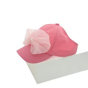 Pink girls' bow sun hat with pearls and quick-dry fabric in a stylish open-top baseball design
