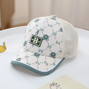 Detail of baby summer baseball cap showing breathable mesh and cute bear print pattern