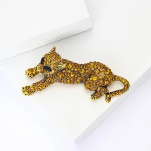 Spilla leopardo scintillante in lega dorata e strass ambrati per completi