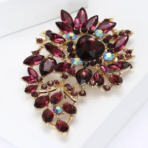 Elegant vintage purple heart glass brooch with crystal flower pattern in gold setting