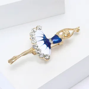 Elegant ballet dancer brooch with blue enamel and sparkling crystals on a golden base