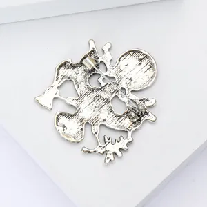 Detailed back view of vintage silver eagle brooch with secure rotating pin and alloy texture