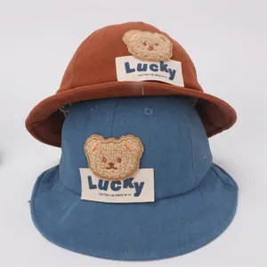 Cappello da pescatore per bambini in velluto a coste con orsetto nei colori marrone e blu