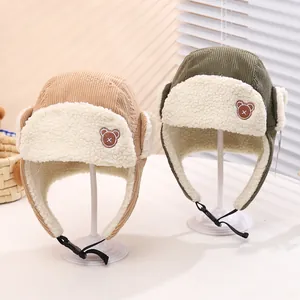 Winter children's corduroy aviator hat with soft faux fleece lining and bear badge