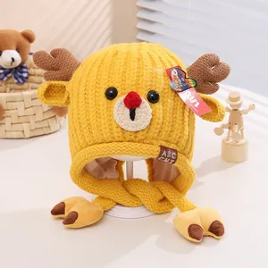 Bonnet renne tricoté pour enfants avec cache-oreilles et bois jaunes pour l'hiver
