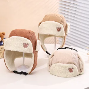 Winter corduroy children aviator hats in brown and beige with cute bear patch
