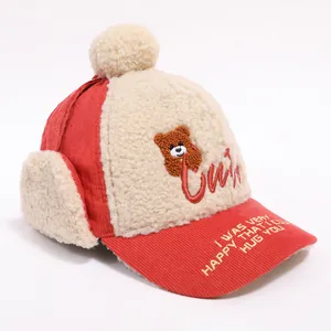 Kids winter corduroy trapper hat with cute bear embroidery and warm earflaps in red and beige