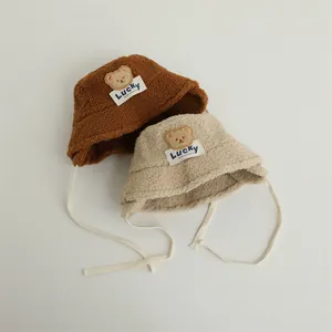 LUCKY bear lamb wool baby bucket hat with ear flaps in caramel and cream colors