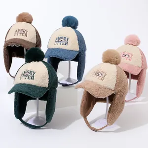 Winter kids fleece trapper hats with pom-poms and cute otter embroidery in five colors