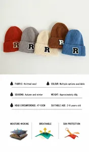 Detailed knit texture of kids beanie with R letter patch in multiple colors