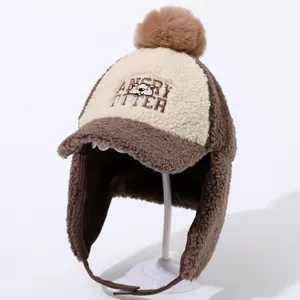 Detailed close-up of winter earmuff hat with lamb fleece and Angry Otter embroidery