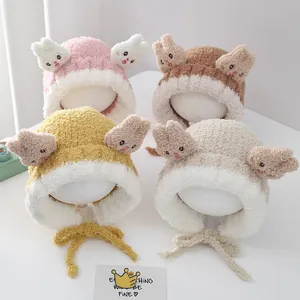 Kids plush winter trapper hat with bunny ears in pink, beige, ginger and brown colors