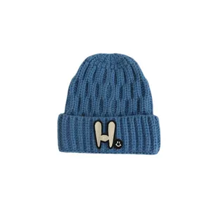 Winter kids knit beanie in navy blue with willow leaf texture and H letter patch