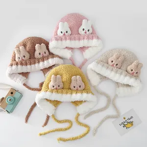 Plush winter earflap hats for kids with cartoon rabbit ears in four various soft colors
