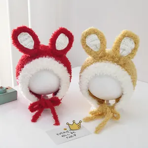 Winter plush rabbit ear hat for kids with windproof earflaps and soft fleece material