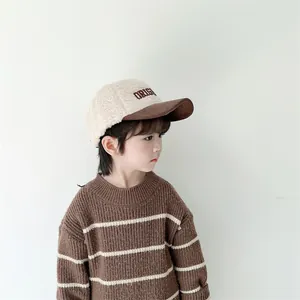 Detail of children's fleece baseball cap with Original embroidery and corduroy brim