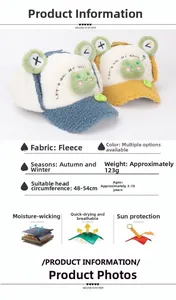 Detail showing soft fleece fabric and frog embroidery on winter baseball caps for kids