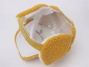 Detail view of yellow faux fur kid hat lining with adjustable strap and inner structure