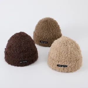 Thick plush knit winter beanie for kids in brown, green, and beige colors