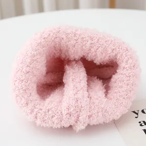 Pink plush kids winter beanie and scarf set featuring soft coral fleece texture