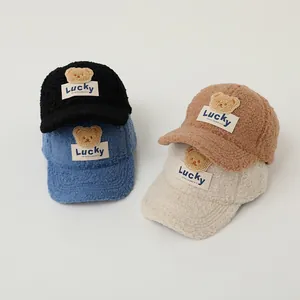 Winter fleece baseball cap for kids with cute teddy bear patch and Lucky label