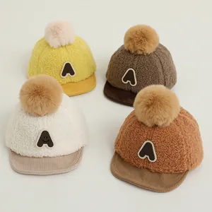Bonnet d'Hiver à Pompon pour Bébé Bambin Garçons Filles Chaud Polaire Velours Côtelé Casquette de Baseball Broderie Lettre A