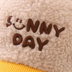 Kids plush beige baseball cap with yellow brim and Sunny Day smile face embroidery