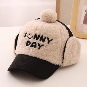 Kids plush winter trapper hat with earflaps and Sunny Day smiley face embroidery