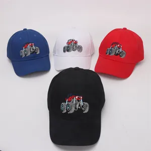 Kids baseball caps with monster truck embroidery in blue, white, red, and black colors