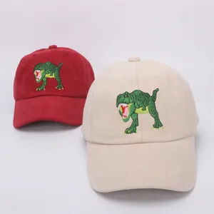 Kids baseball cap with dinosaur embroidery in red and beige cotton twill fabric