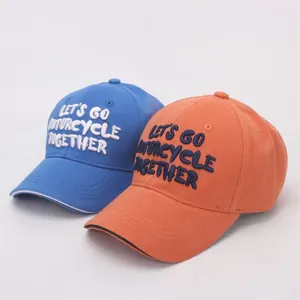 Kids baseball cap with 3D embroidery featuring navy blue and orange cotton twill fabric
